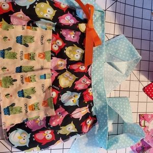 Little girls aprons with Jumbo crayons